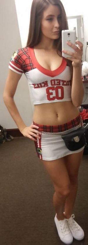 Hot tiltedkilt waitress taking a selfie