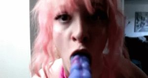 Slut fucks and sucks Bad Dragon Dildos at same times