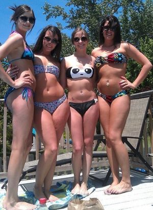 Bikini girlies out by the pool