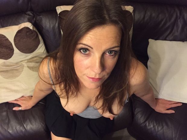 sexy milf POV on couch with her tits out looking up