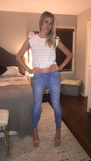 sexy milf in high heels, jeans and t shirt