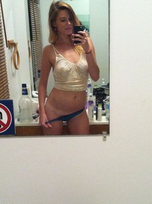 sexy blonde in sexy tank top and panties