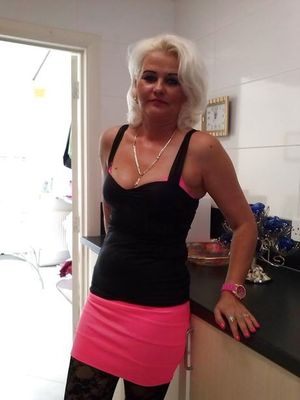 Sexy amateur mom is so sexy in her outfit.