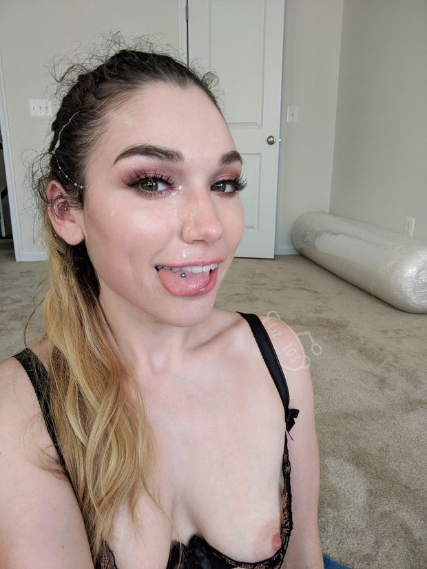 cute blonde selfie with her tits out and cum on her face