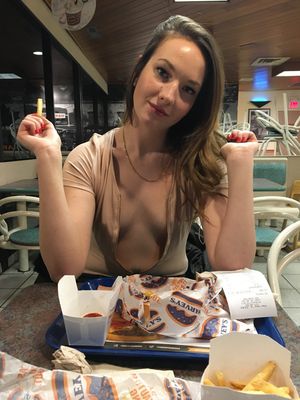 brunette flashing her small tits in public restaurant