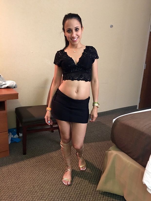 cute smiling brunette stripping in hotel room with small tits