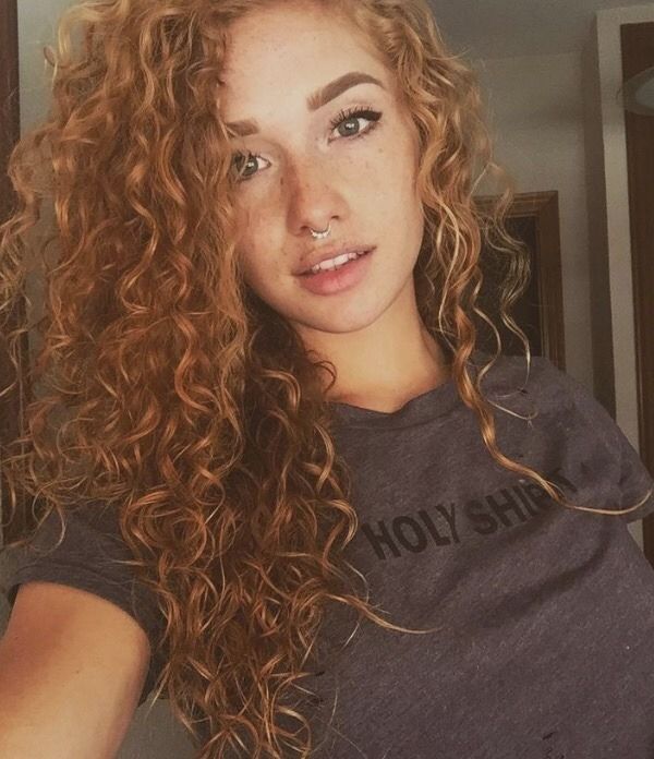 Redhead with curly hair