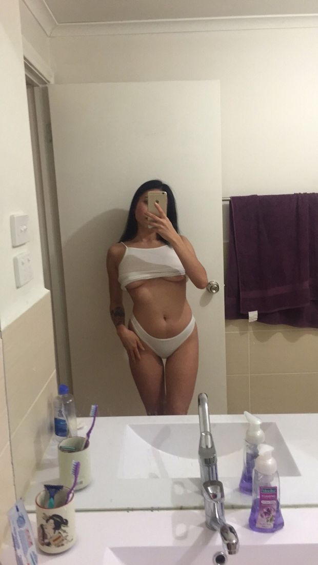 selfie in tank top and panties showing under boob