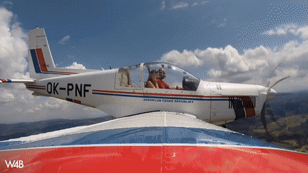 Connie Carter having fun in a plane