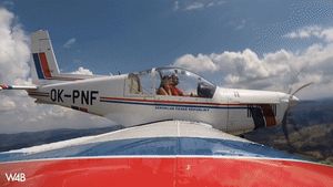 Connie Carter having fun in a plane