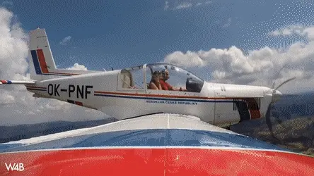 Connie Carter having fun in a plane