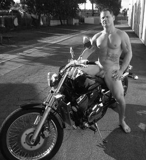 Hot Daddy on a motorcycle