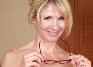 Sexy MILF Roxy Takes Off Glasses