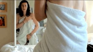 masturbating in front of a mirror