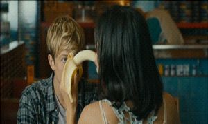 sucking a banana