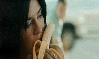 sucking a banana