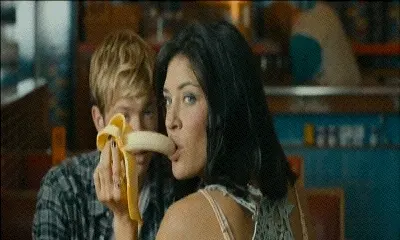 sucking a banana