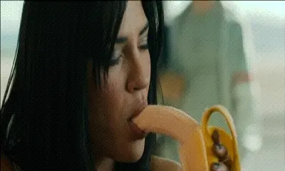 sucking a banana