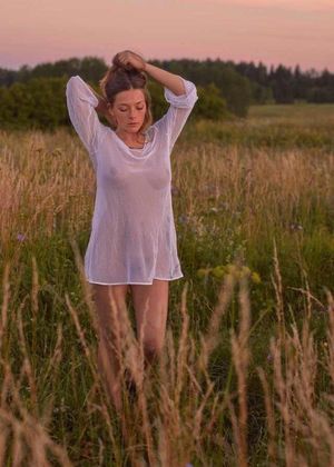 Olga Kobzar in a see-through top