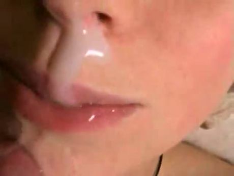 She gets her mouth full of cum and swallows