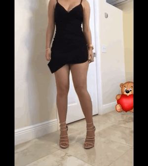 Rosa Verte peels up dress