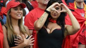 Pretty brunette sports fan.