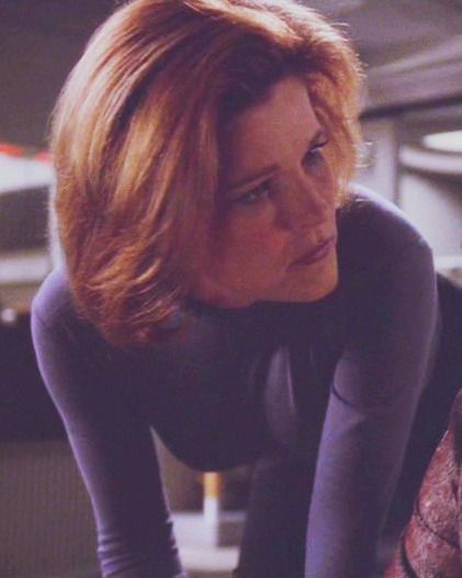 Kate Mulgrew as Captain Kathryn Janeway in Star Trek: Voyager