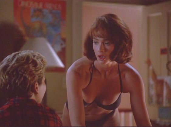 Lauren Holly as Maxine Stewart in Picket Fences