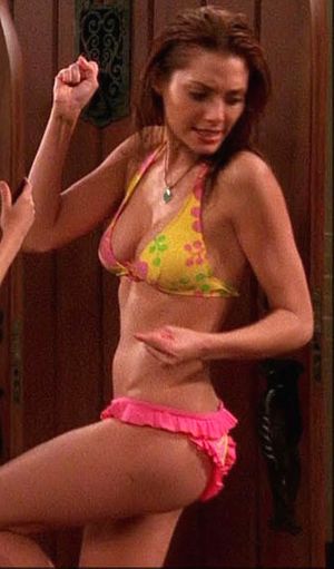 April Bowlby as Kandi in Two and a Half Men