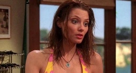 April Bowlby as Kandi in Two and a Half Men