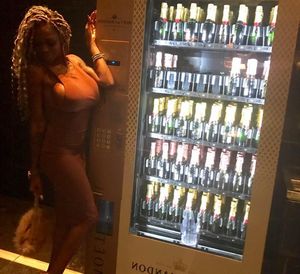 Amateur Black Bimbo Caught Being Sexy Near A Vending Machine