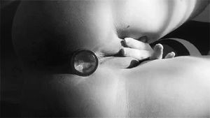 buttplugged slut playing with her pussy