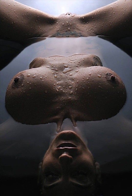 Relaxing in the water naked