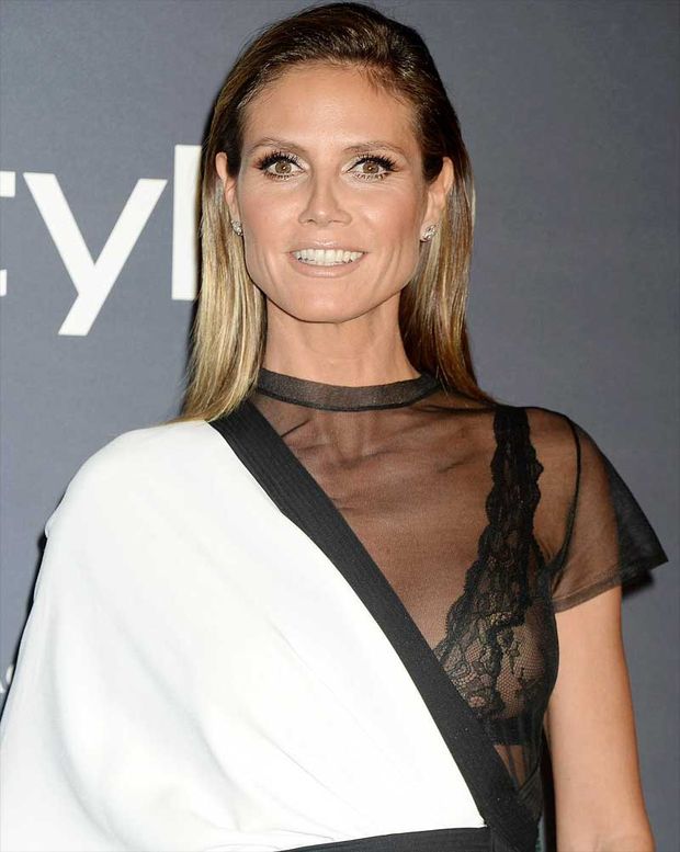 Heidi Klum Single Nipple Peek in Black Bra