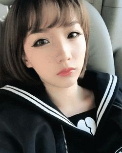 beautiful cute asian babe taking sexy selfie