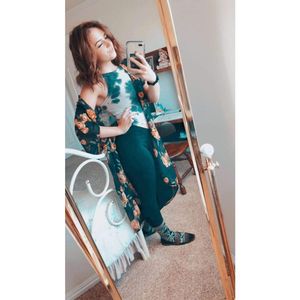 Hannah Thomas is looking sexy as hell in green dress