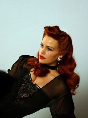 Carla Gugino as Sally Jupiter / Silk Spectre in Watchmen