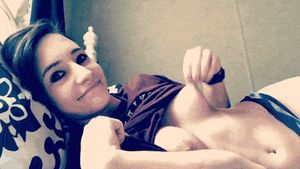 Busty teenage naked selfie eon bed fondling her tits