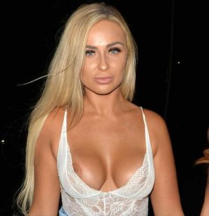 Georgie Clarke Nip Slip in White Lace Bodysuit
