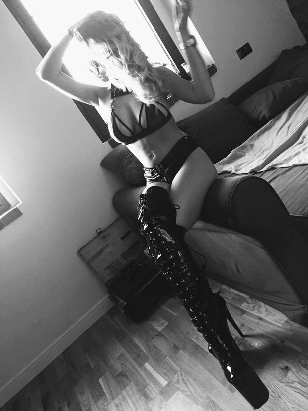 Hot teen posing in sexy lingerie and high boots