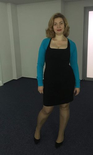 Redhead dressed milf