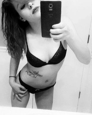 She wants to show you her new tattoo.