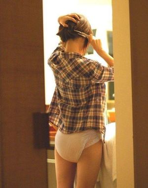 Diapered woman gets ready to go