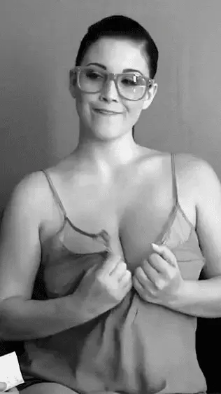 tearing her top