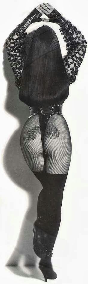 Cher Bono showing her rear in a skimpy outfit.