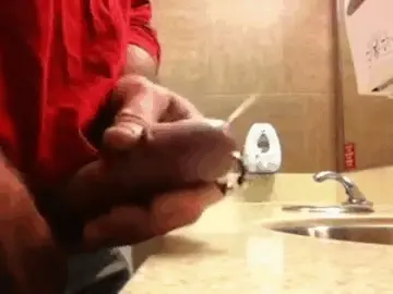 Another cumshot in a public restroom