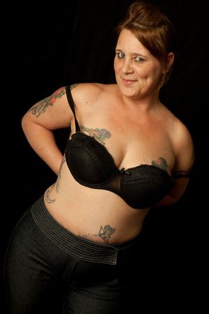 MILF Jackie non-nude and taking off her bra