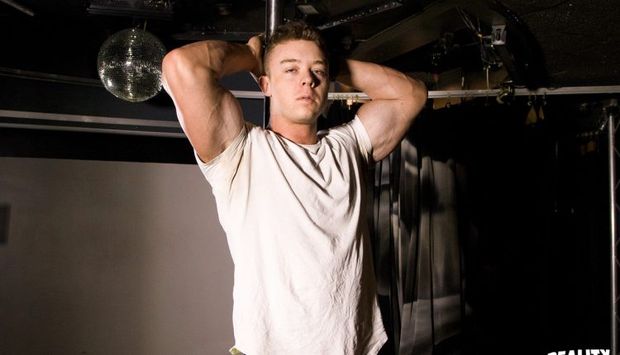 Male bodybuilder Jackson strokes his dick