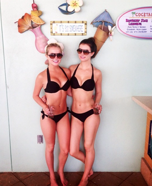 College amateur friends in black bikinis