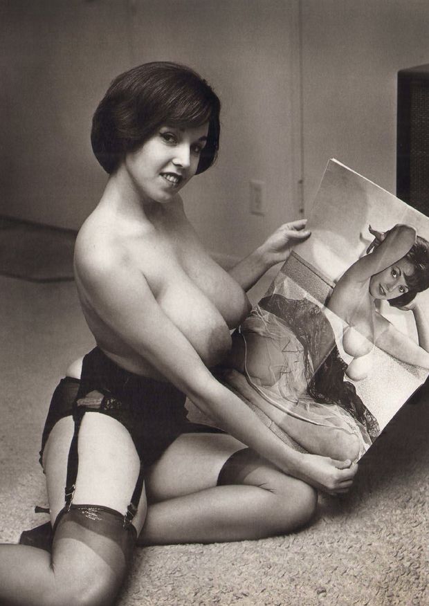 Vintage Pin-Up Model with huge natural Tits and short hair wearing lingerie